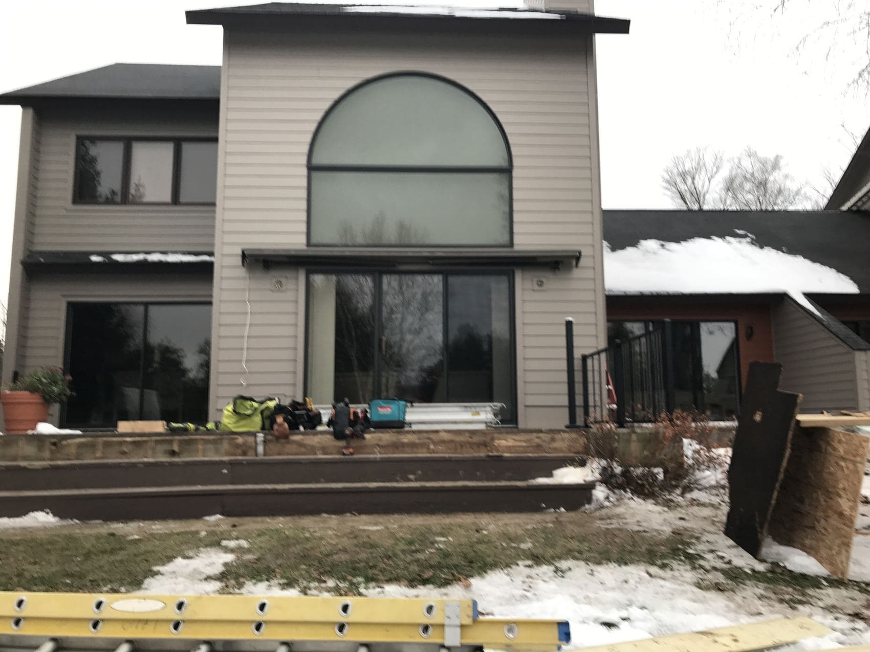 Deck work at a Petoskey home during a Northern Michigan winter