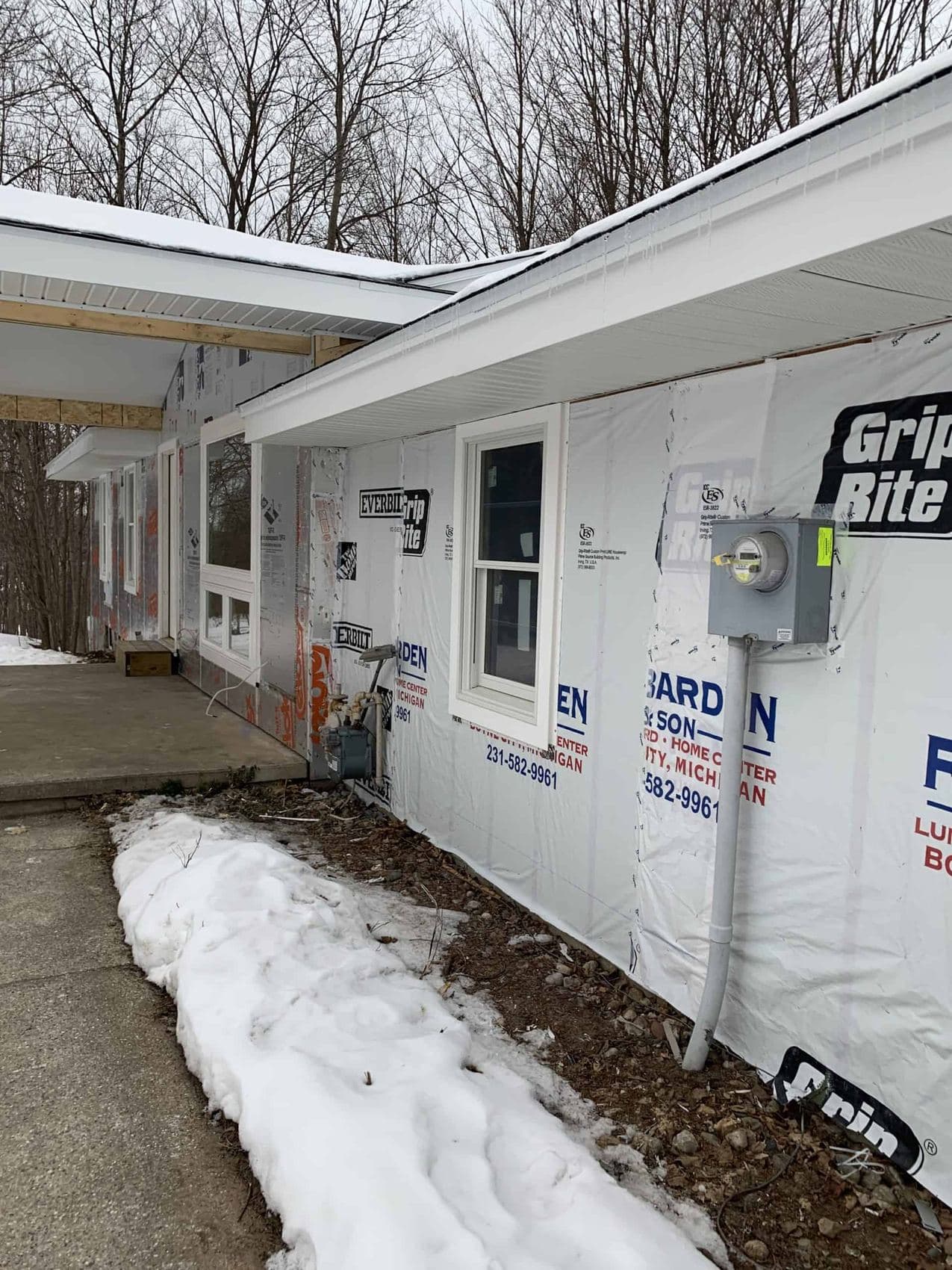 New exterior insulation and house wrap on a remodel