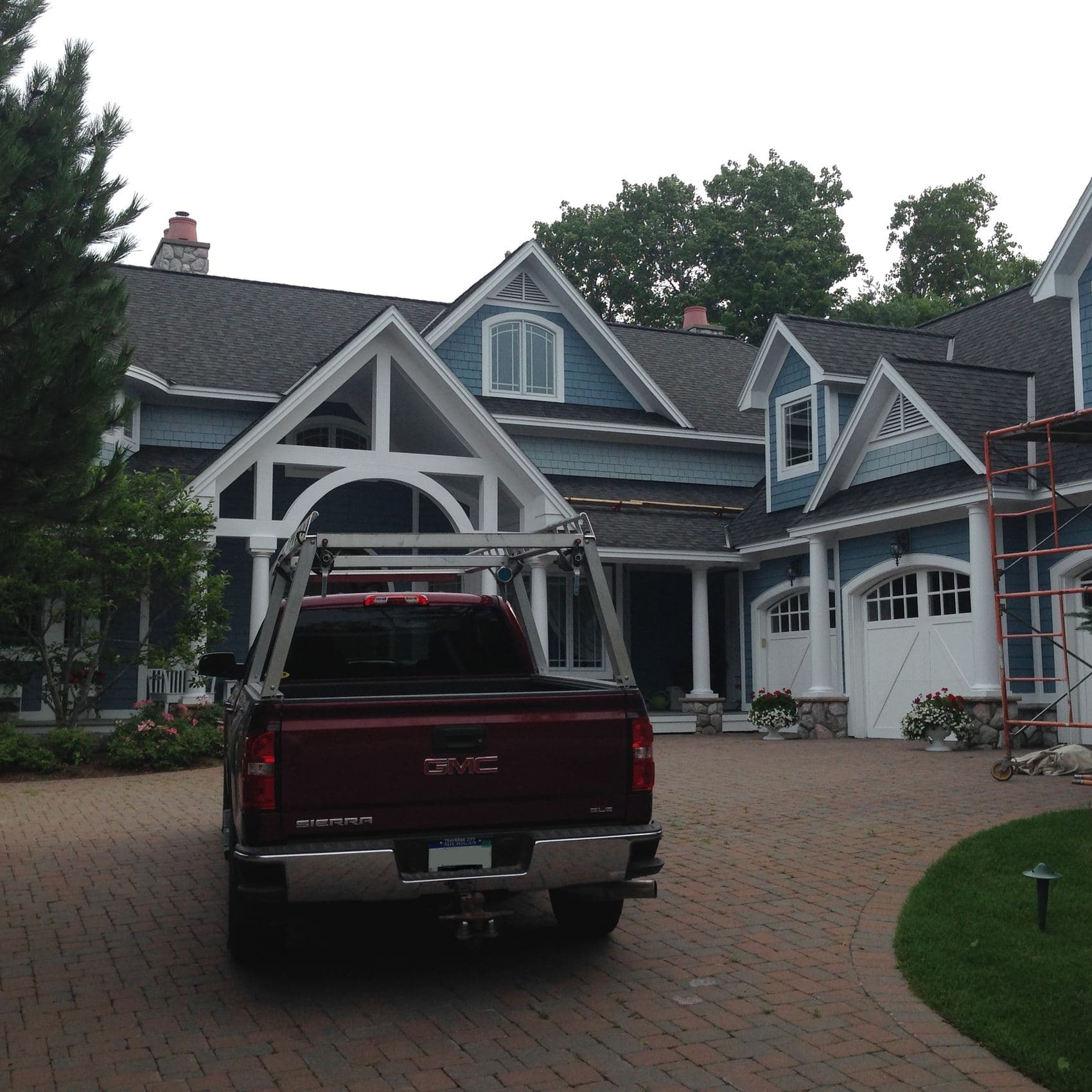 Painting a large house in Bay Harbor, Michigan