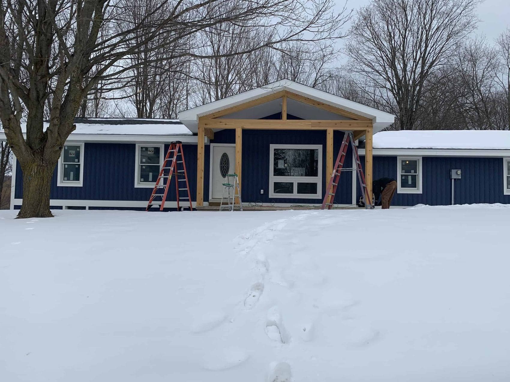 Insulation and exterior work on a Boyne City home in winter