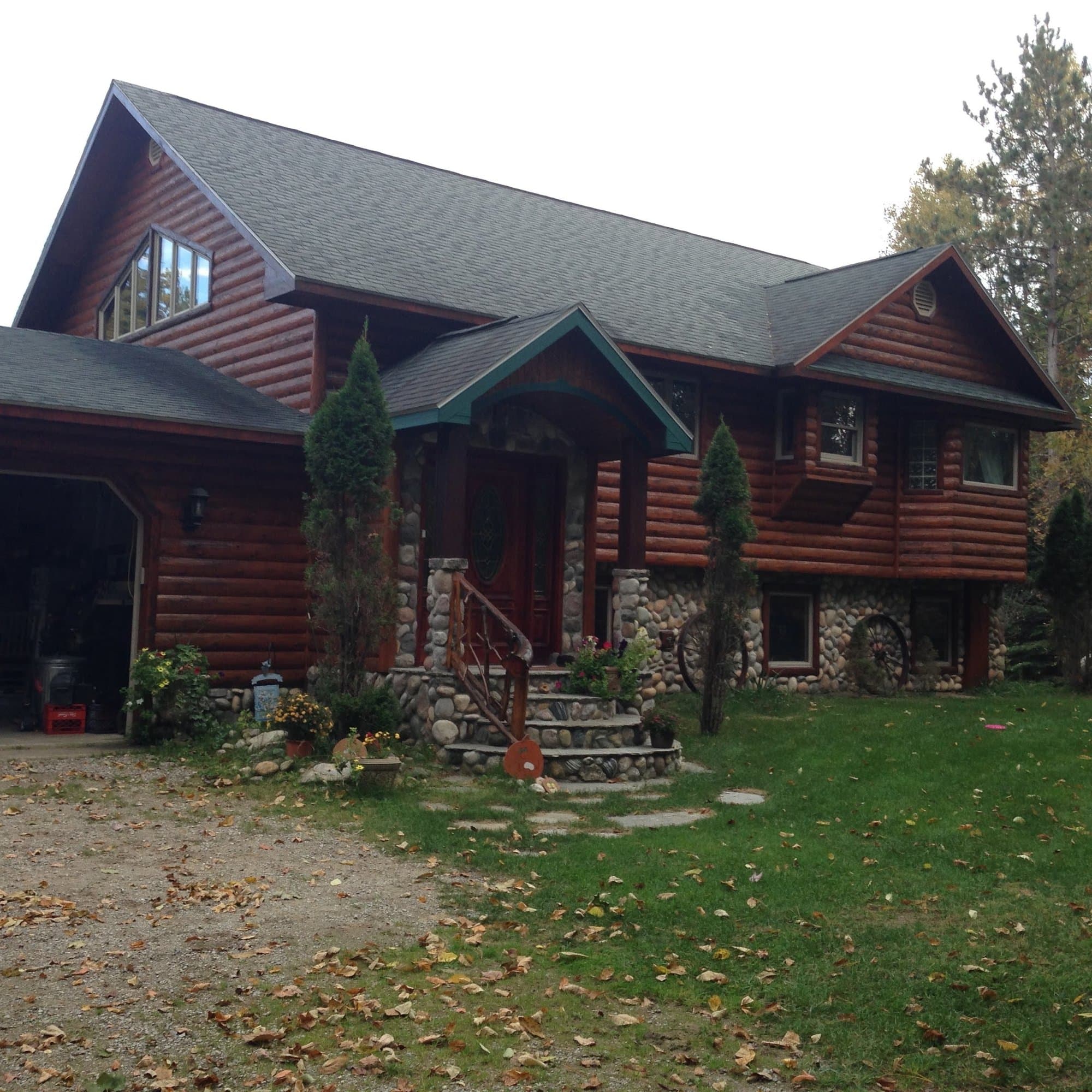 Log home exterior work by TNT Construction
