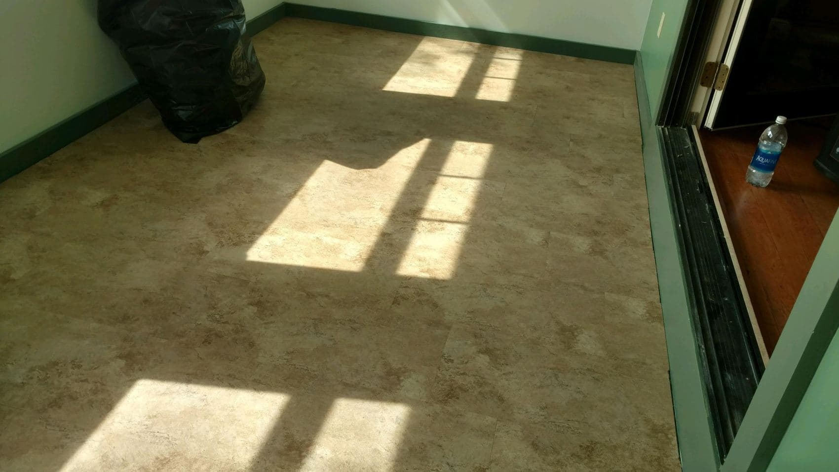 New flooring and interior finish work in a finished room