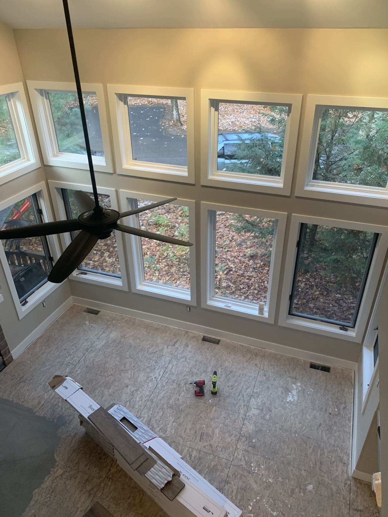 New window wall trimmed and painted in a Petoskey home