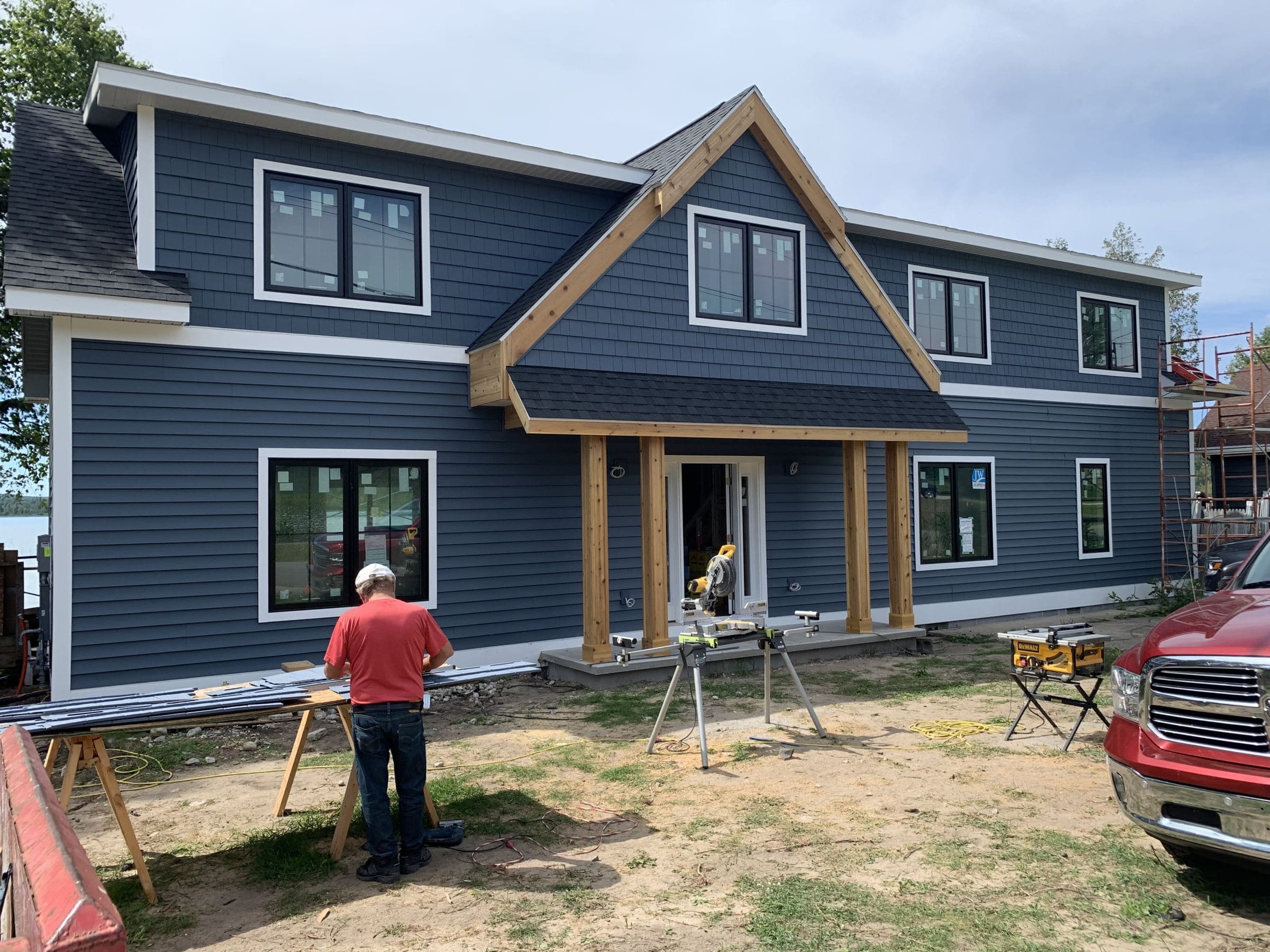 New windows and siding on a home near Deer Lake in Boyne City
